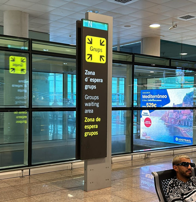 Barcelona Terminal 1 group waiting area sign