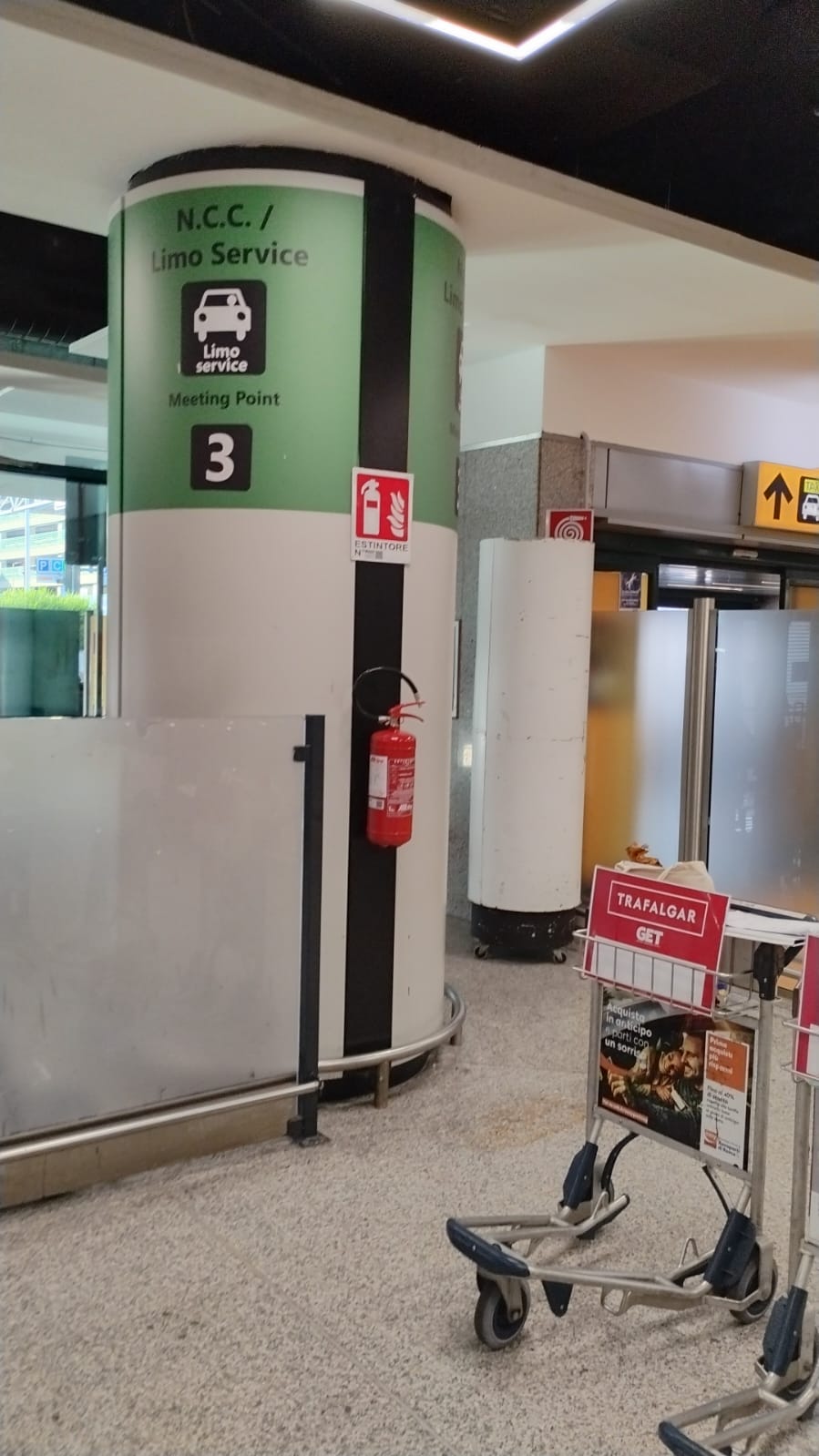 Meeting Point 3 green column at Rome Fiumicino Airport